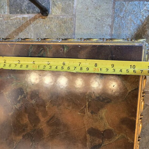 Vintage gold side table used with gilded details