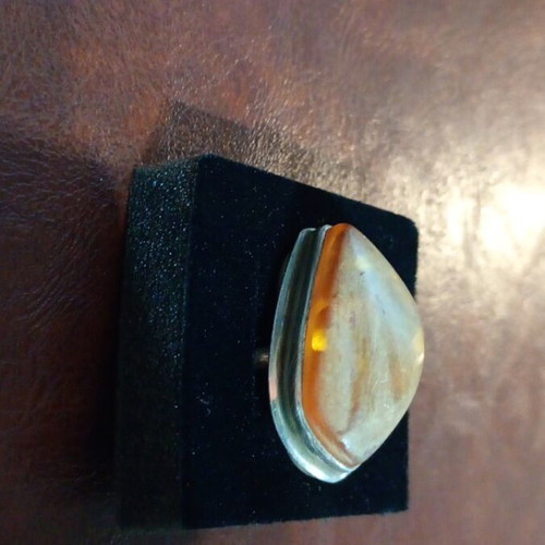 Silver women's ring with amber used