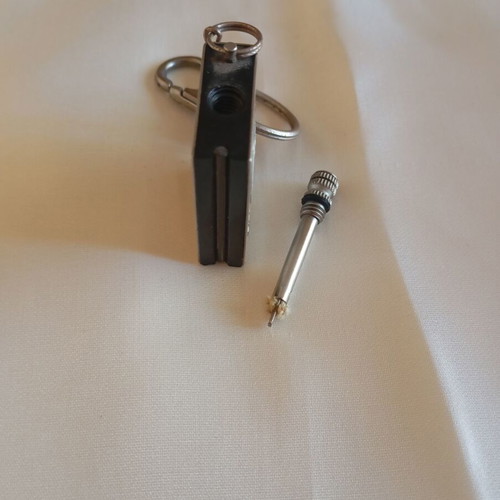 Vintage biker legend keychain lighter like new, nickel color