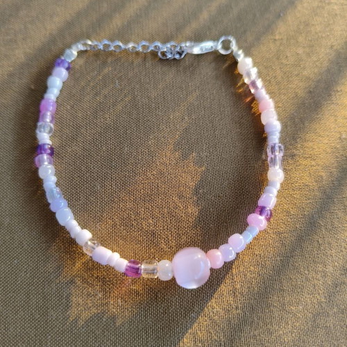Handmade pink bracelet with silver elements