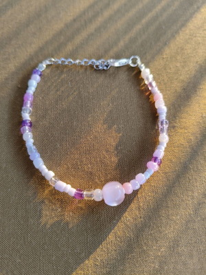 Handmade pink bracelet with silver elements