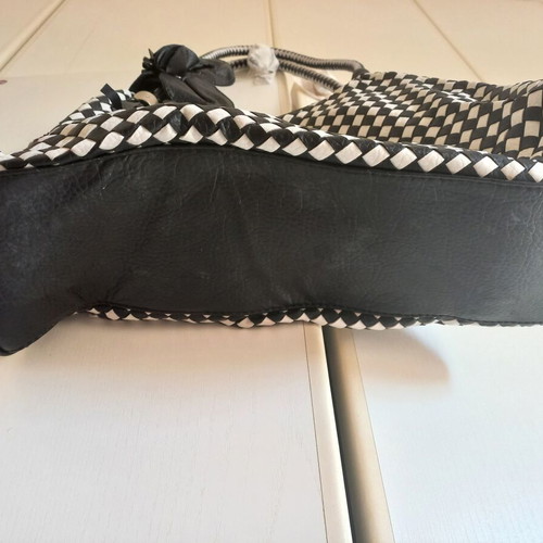 Black and white chic shoulder bag with flower detail