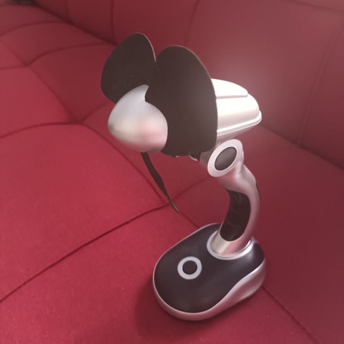 Portable fan used with base and rotating head, AA battery powered