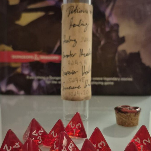 DnD healing potion bottle with 10 red tetrahedral dice