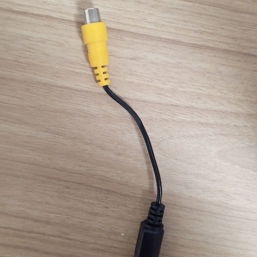 TV-video-out mini-DIN to RCA cable adapter used