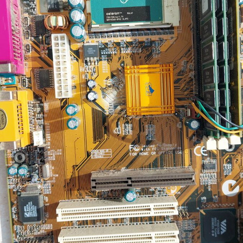 Vindage motherboard with Celeron processor and 3 memories