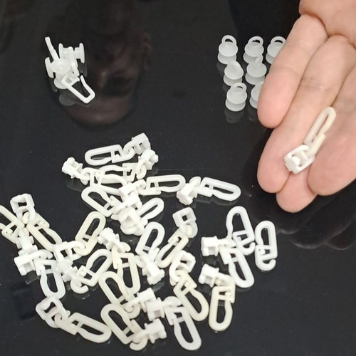 Plastic curtain hooks like new