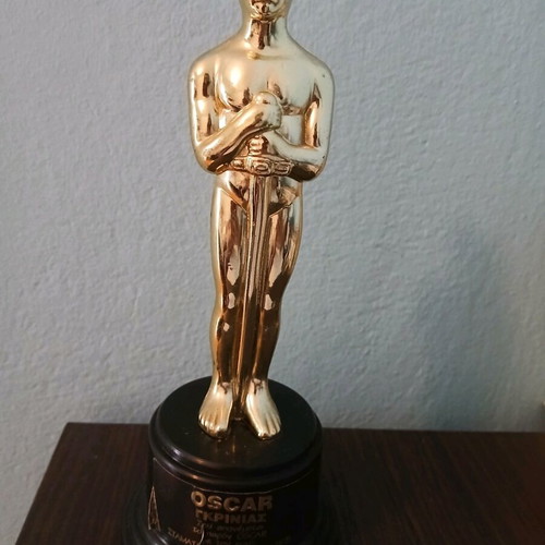 Oscar Grinias decorative plastic trophy used, funny gift