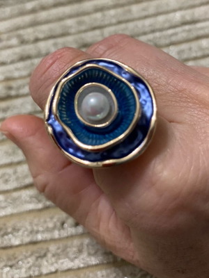 Ring made of steel with purple and gold color like new