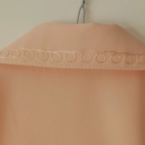 Women's salmon shirt like new with embroidered collar detail