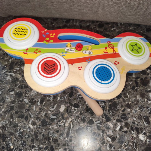 Wooden drum toy with music used