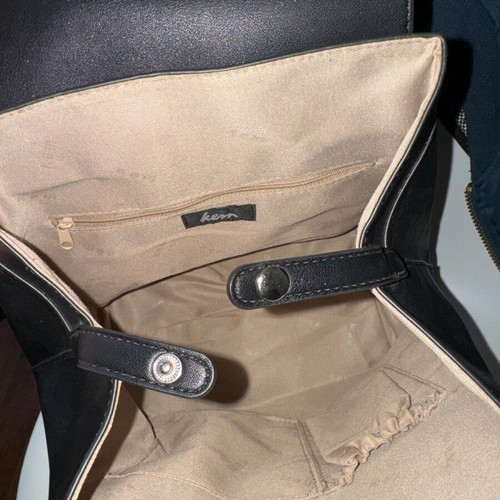 KEM black backpack bag like new with minor scratches on clasp
