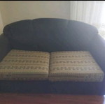 Double sofa bed used, black fabric with covers
