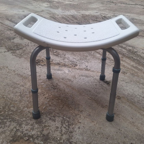 Adjustable Bathroom Stool like new with ergonomic plastic seat and aluminum frame