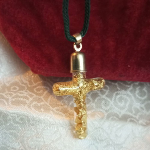 Cross with pure gold leafs in solution, metal