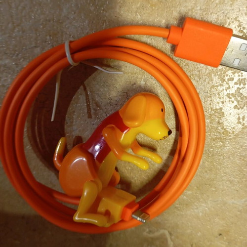 iPhone charger new with moving dog figure