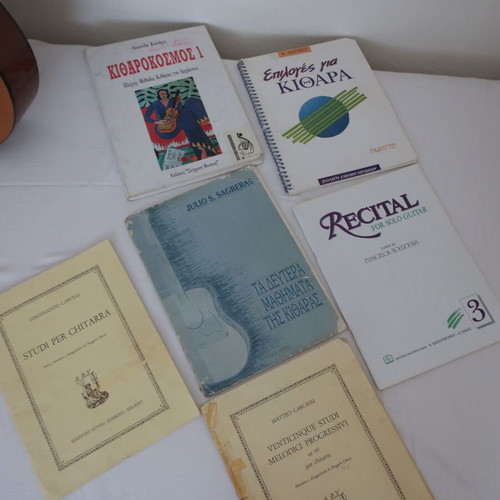Classical guitar used with 6 books, case, and footstool