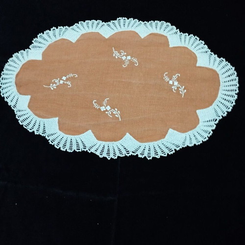Handmade embroidery with crochet lace used