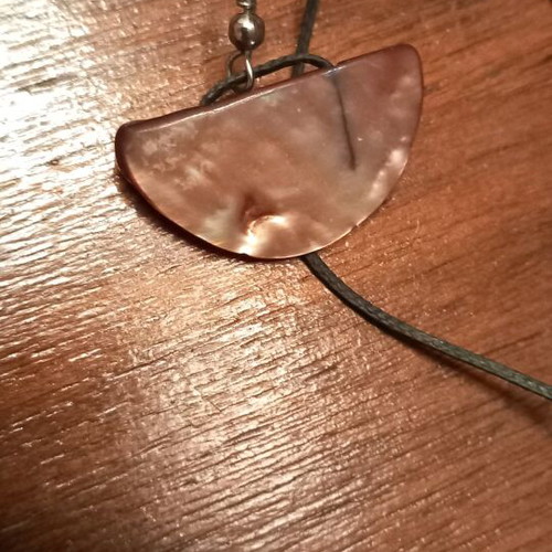 Earrings like new made of natural shell material