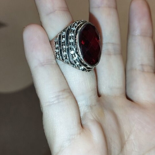 Statement cocktail ring with large red stone and rhinestones