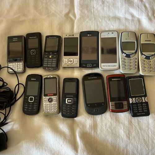 Various used cell phones, some working