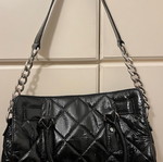 Michael Kors Black Handbag like new, pattern leather