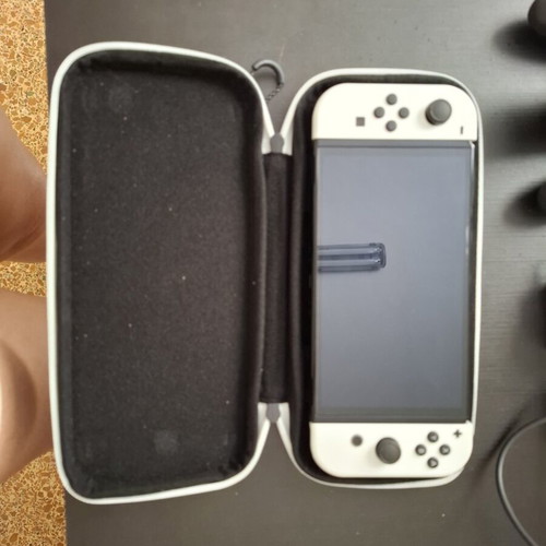 Nintendo Switch like new with original accessories and Super Mario Bros Wonder