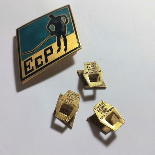 Set of vintage sports enamel pins with ice hockey theme, used