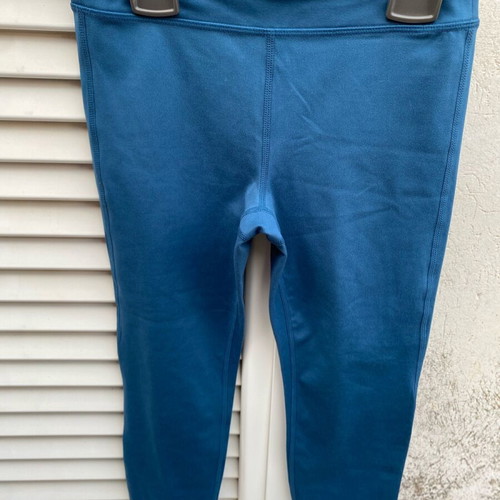 Children's sports leggings size L (10-12) like new, blue capri