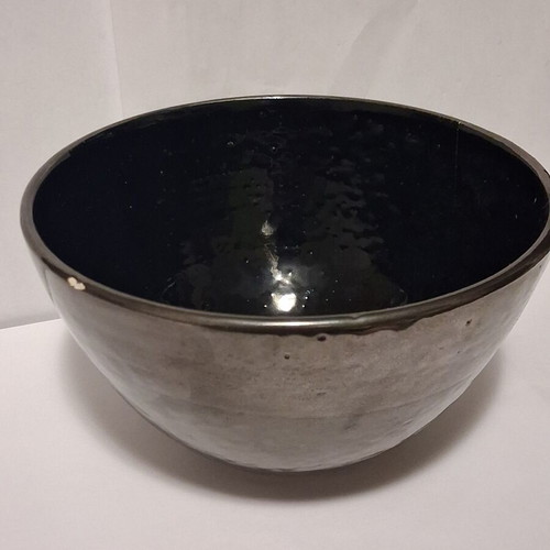 Eleni Vernadaki ADC studio pottery bowl with silver metallic surface