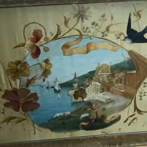 Prewar silk embroidery in frame with wear marks