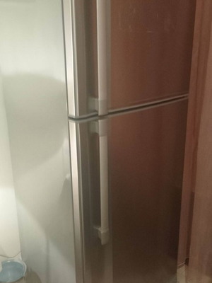 Refrigerator with large top freezer no frost, like new, 7 feet