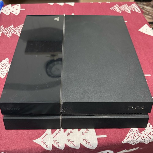 Ps4 500GB used with original controller and 8 games