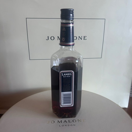 Lamb’s Navy Rum like new with hexagonal bottle