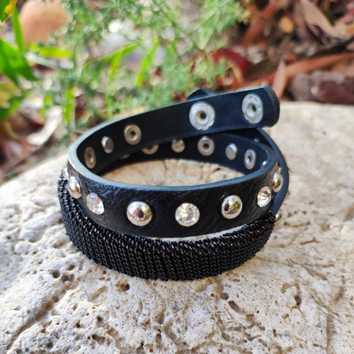 Bracelet with rhinestones and studs, like new, black leather