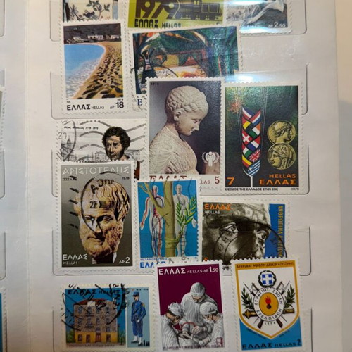 International Stamp Collection album with large vintage Greek and foreign stamps lot