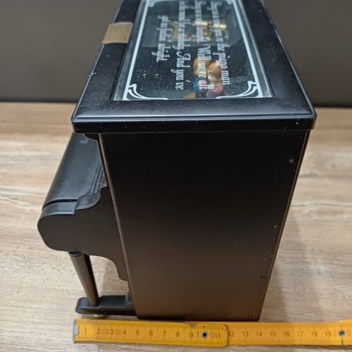 Piano music box used with compartments for small jewelry plastic