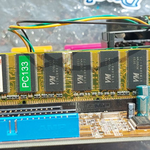Vindage motherboard with Celeron processor and 3 memories