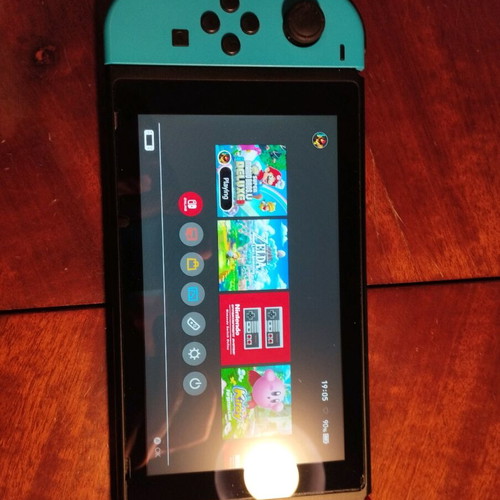 Nintendo Switch console with custom firmware and 126GB SD card