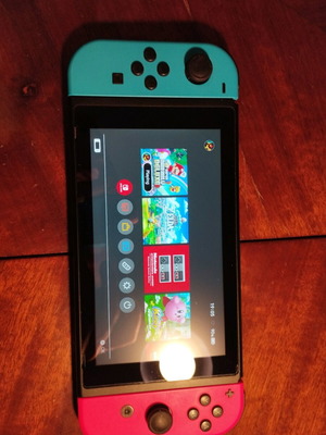 Nintendo Switch console with custom firmware and 126GB SD card