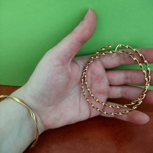 Stainless steel jewelry set used, gold color, includes bangle and hoop earrings