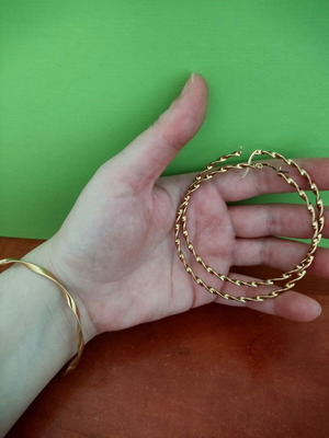 Stainless steel jewelry set used, gold color, includes bangle and hoop earrings