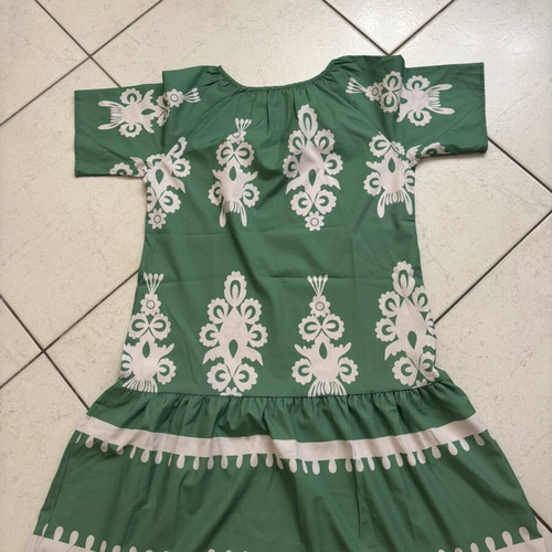 Dress with white patterns in vibrant green, new, size M