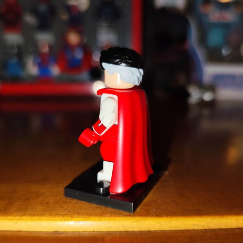 Omni-Man figure like new with base and two heads