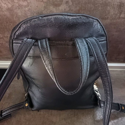 Guess backpack used with leather cracks