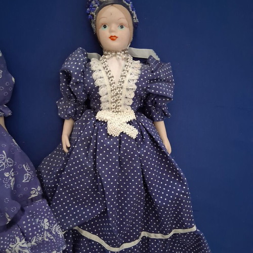 Vintage Slavic doll with porcelain head and fabric body