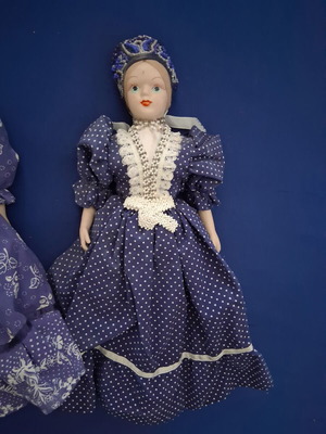 Vintage Slavic doll with porcelain head and fabric body