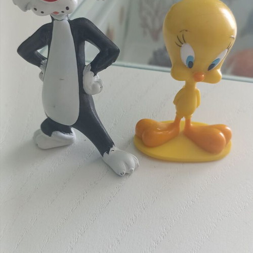 Twitty & Silvester figures like new, 2 miniatures