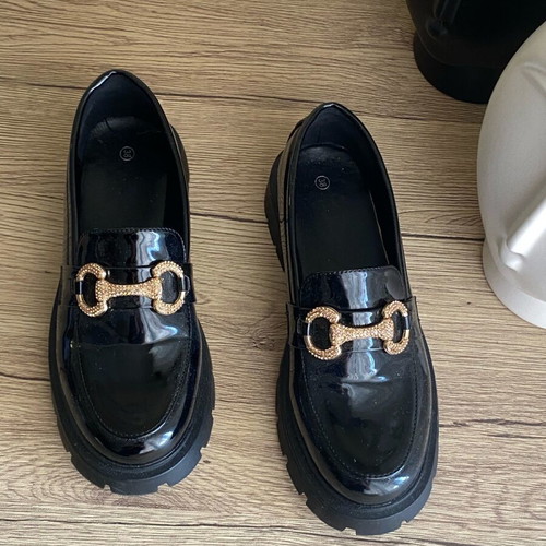 Women's loafers size 38 like new, black patent leather with gold buckle