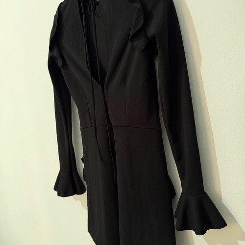 Zara one-piece shortsuit used, black with ruffles and open back